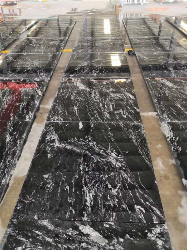 black and white granite forest black