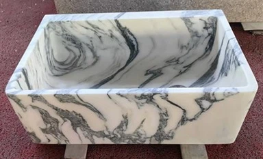 Раковина из белого мрамора